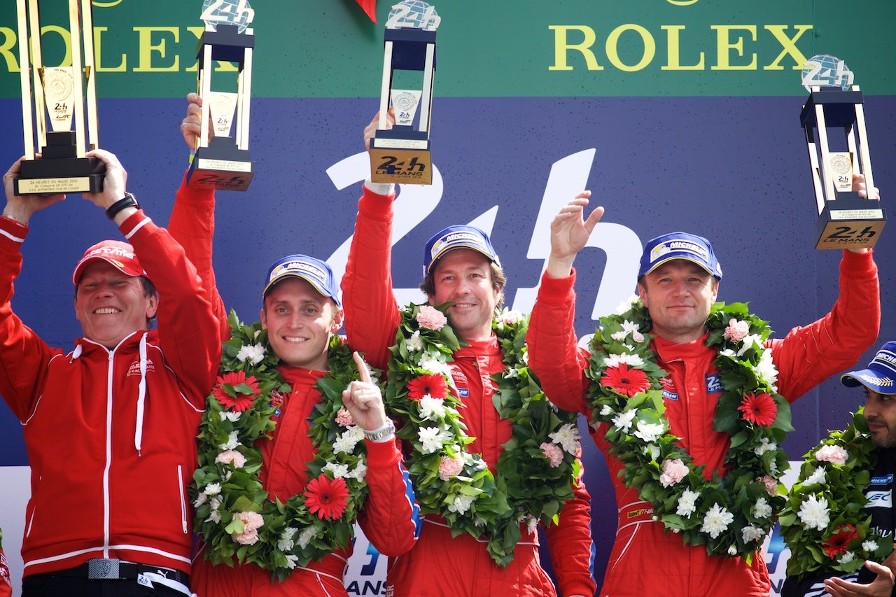 Jeff Segal (second from left) celebrates a class win at The Rolex 24 at Daytona in 2014., <i>Jeff Segal</i>