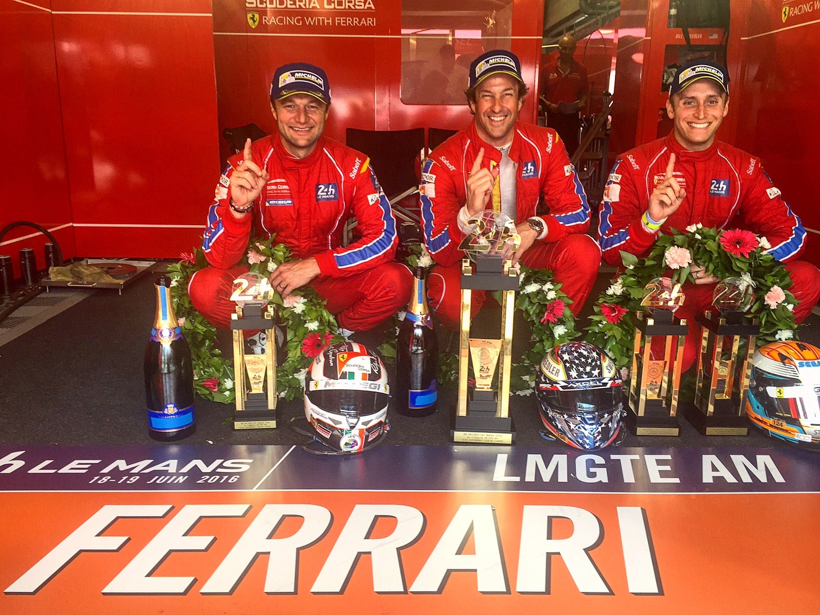 Jeff Segal (far right) celebrates a class win at the 24 Hours of Le Mans in 2014., <i>Jeff Segal</i>