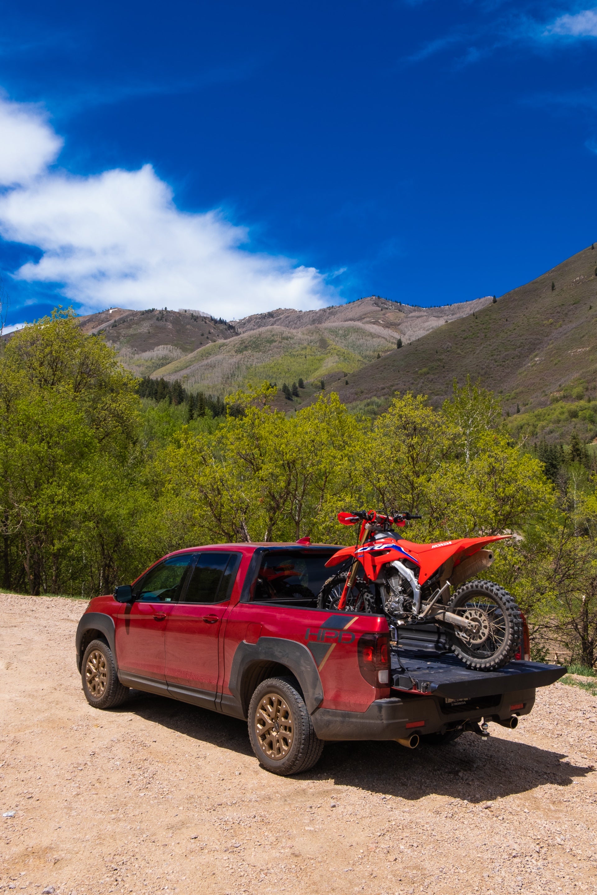 The Ridgeline with a CRF450RX in the bed., <i>Jonathon Klein</i>