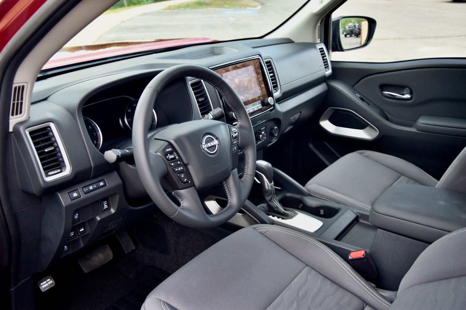 2022 Nissan Frontier SV king cab dashboard, <i>James Gilboy</i>