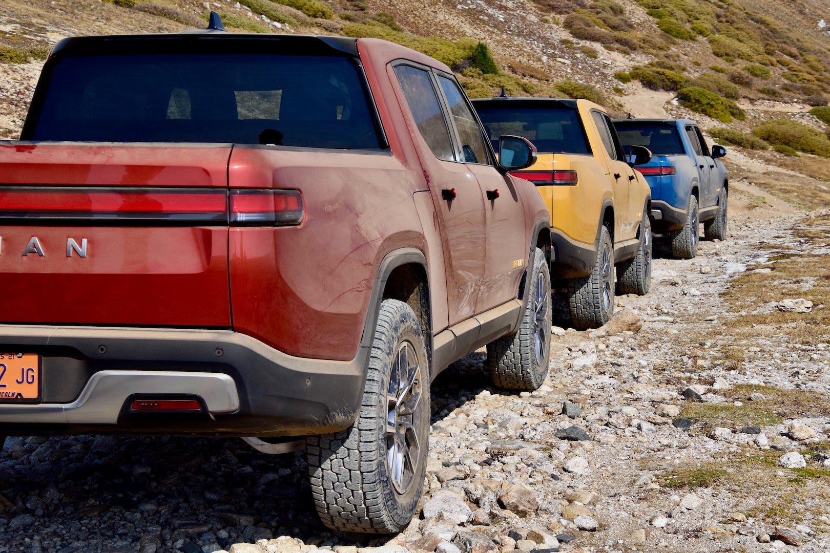 <p class="caption-title">2022 Rivian R1T Launch Edition in red, yellow, and blue</p>, <i>James Gilboy</i>