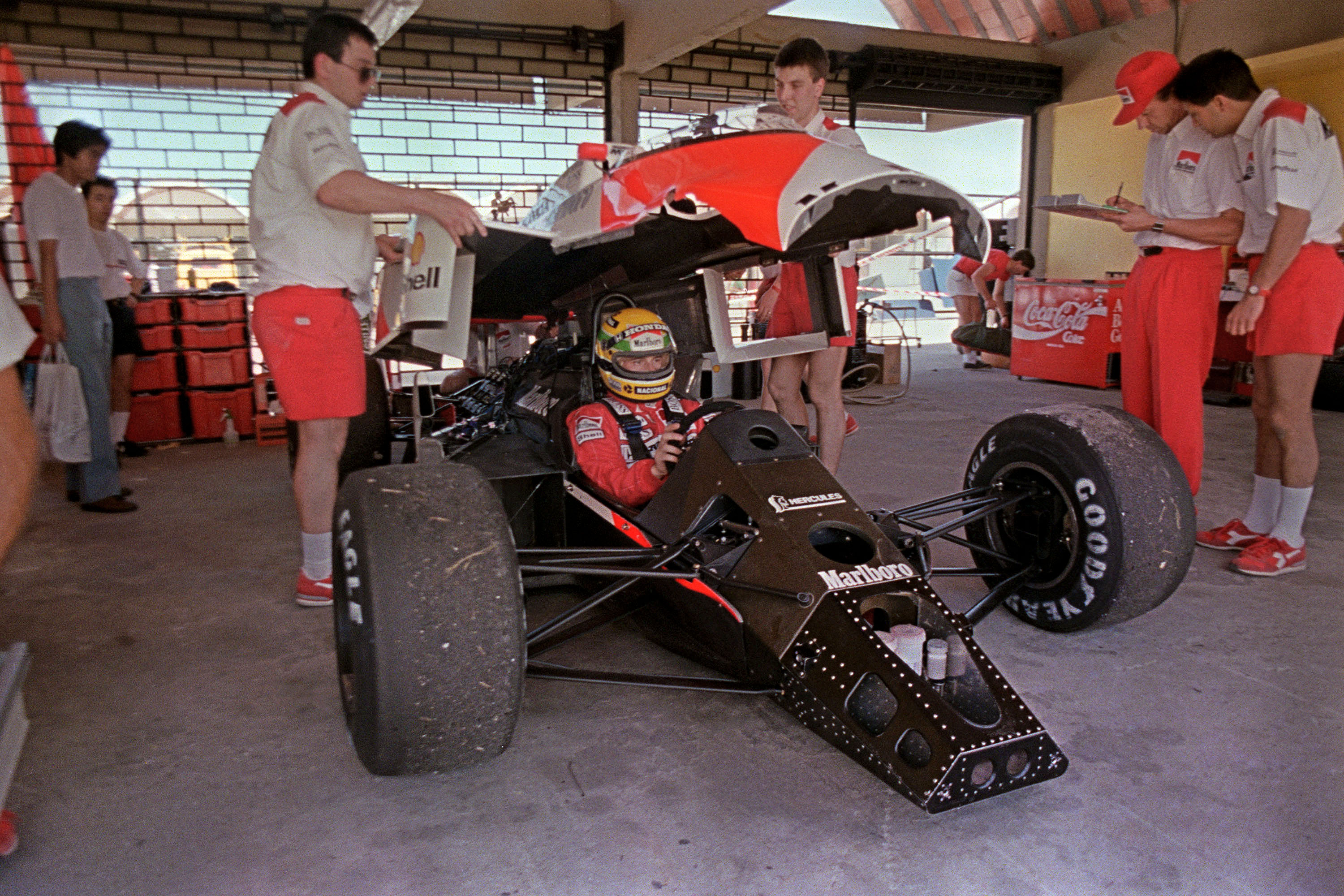 1993: McLaren mechanics work on Senna