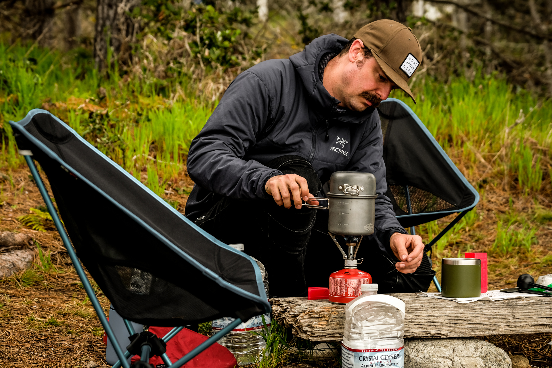 A backpackers stove-and-pot combo allow you to heat up water for coffee, oatmeal, and even cook food. Always plan ahead and think about what you want to make at camp. , <i>Sam Bendall</i>