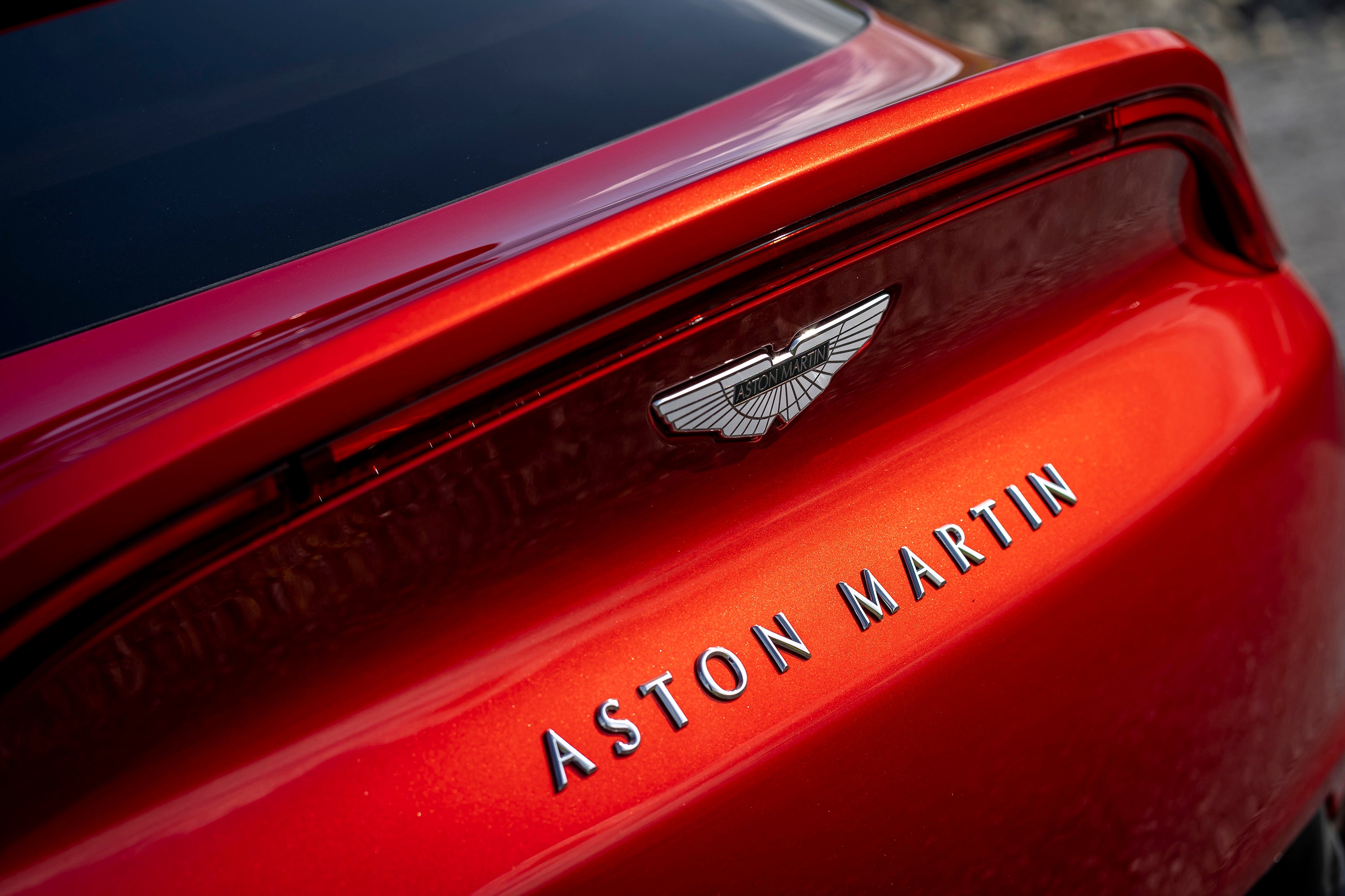 message-editor%2F1603897276241-aston_martin_dbx__hyper_red__a1_aml__259-jpg.jpg