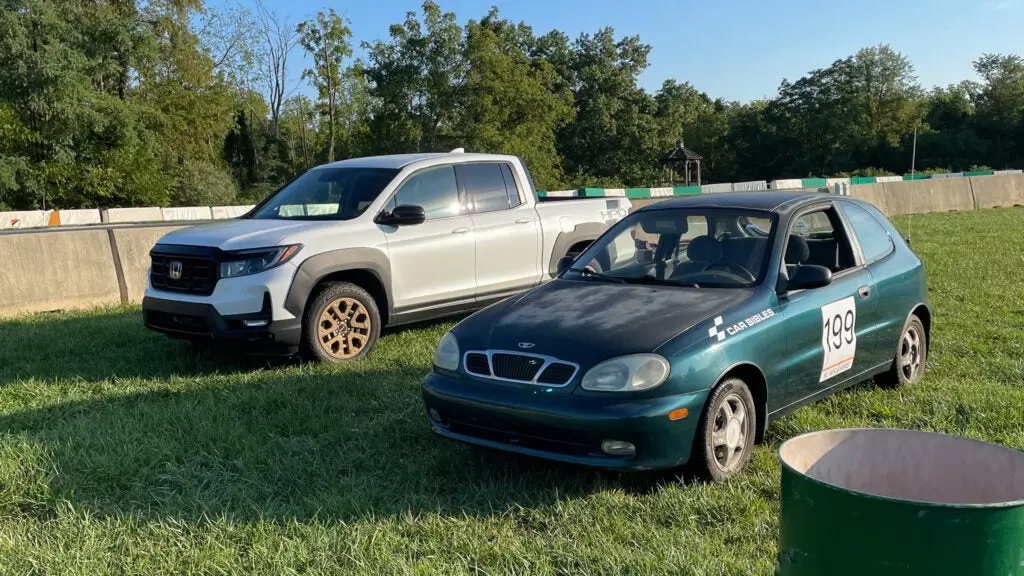 Daewoo and 2021 Ridgeline Parked At Summit Point Raceway