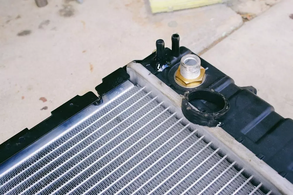 It Only Took a Tiny Bit of JB Weld To Do a Flawless Radiator Installation In My Land Rover Discovery