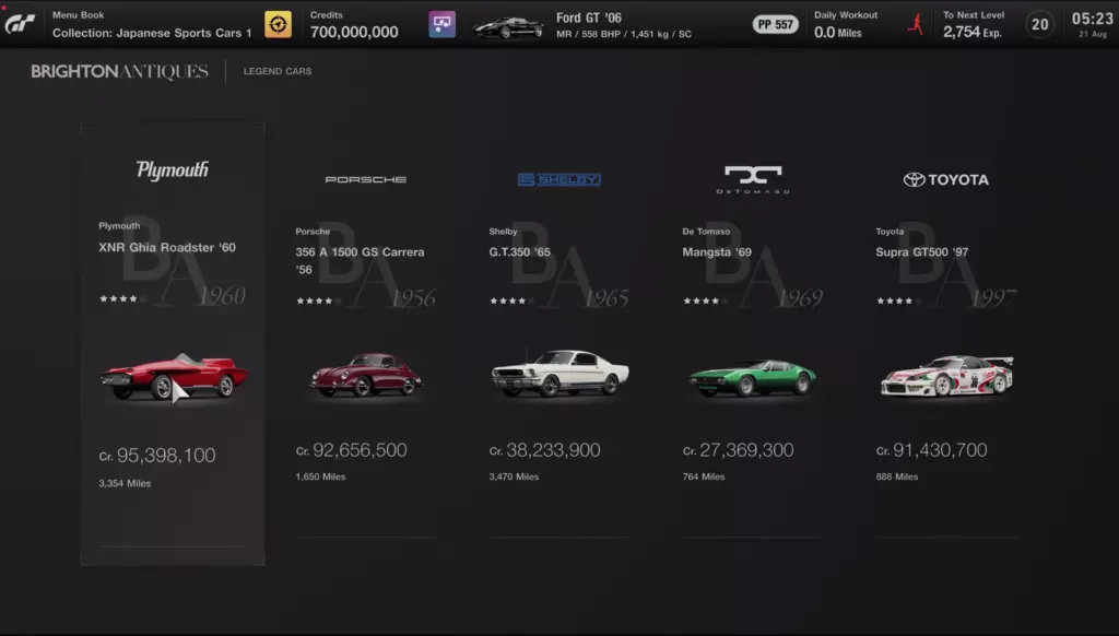 Classic car shop menu in Gran Turismo 7 showing from left to right a 1960 Plymouth XNR Ghia Roadster, 1956 Porsche 356 A 1500 GS Carrera, 1965 Shelby GT350, 1969 De Tomaso Mangsta, and the 1997 Castrol Toyota Supra GT500 car.