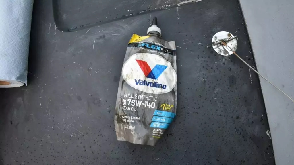 A Valvoline Flex Fill pouch on top o f the hood of a '60s Dodge Charger.