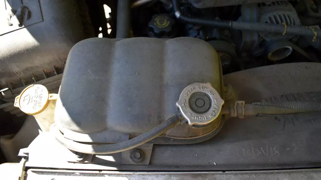 A close-up of a radiator cap on a '60s Dodge Charger.