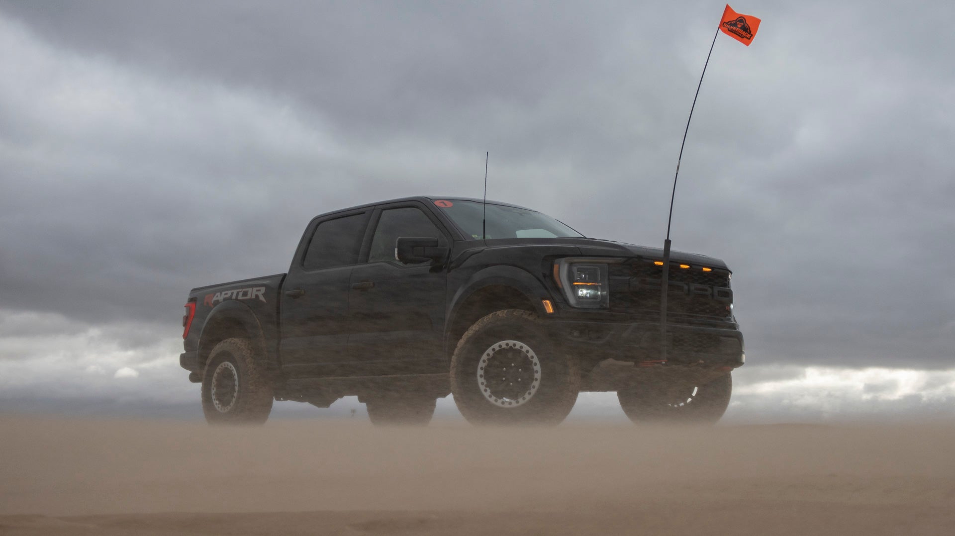 2023 Ford F-150 Raptor R in a sand storm.