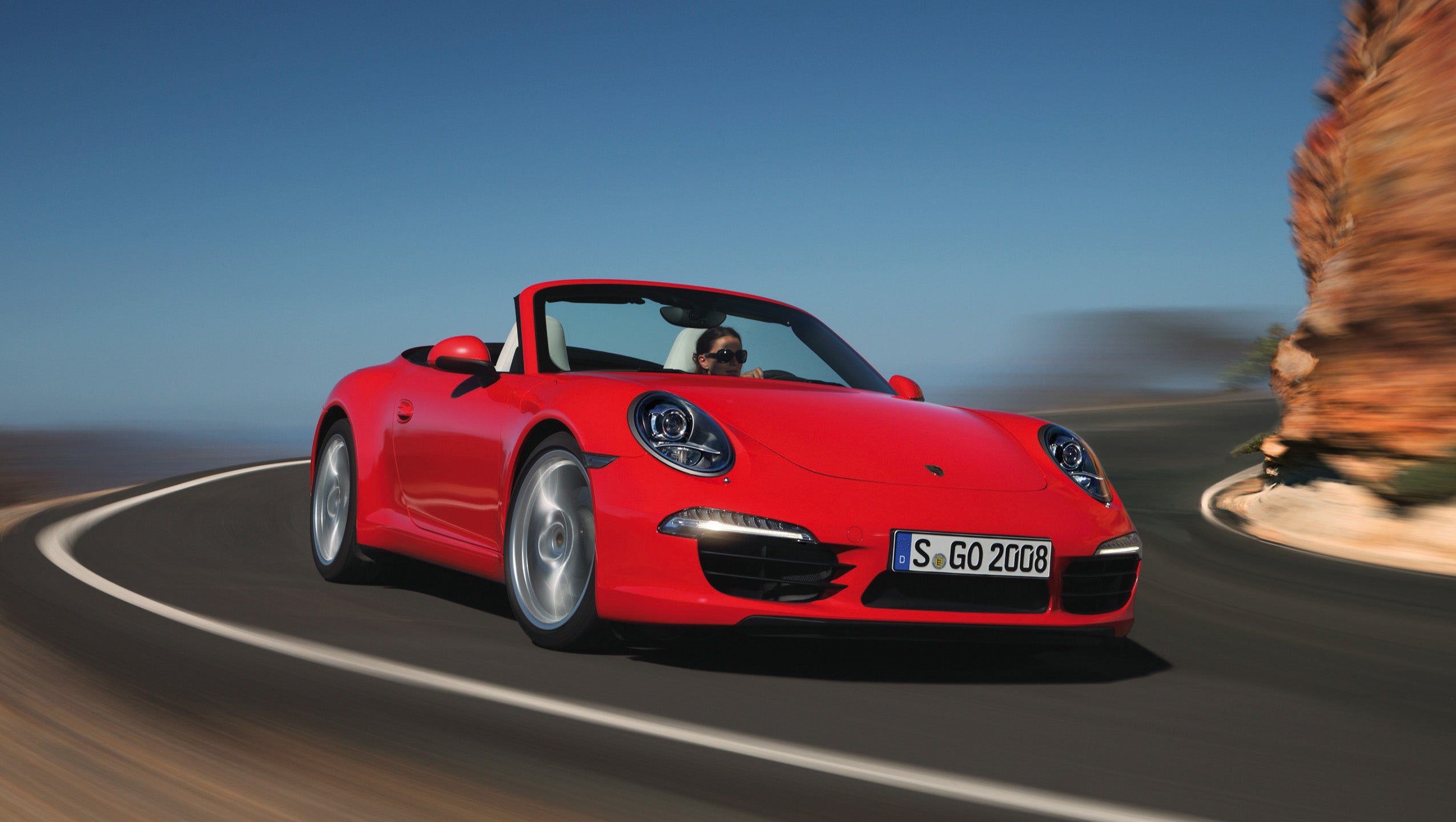 Porsche Will Pay Some Owners $1,100 to Settle Over Bogus MPG Claims