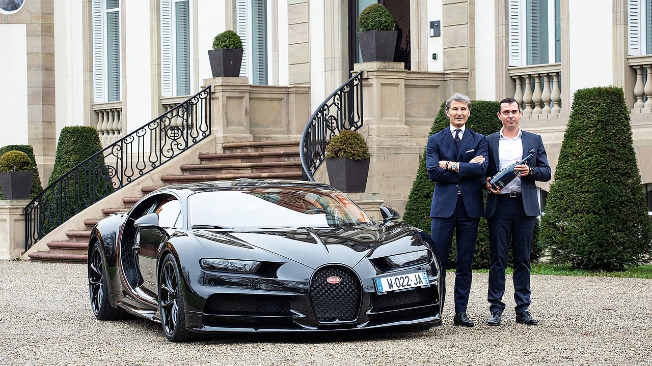 Bugatti Chiron Shown Off in Naked Carbon Fiber to Sell Champagne to Rich Moguls