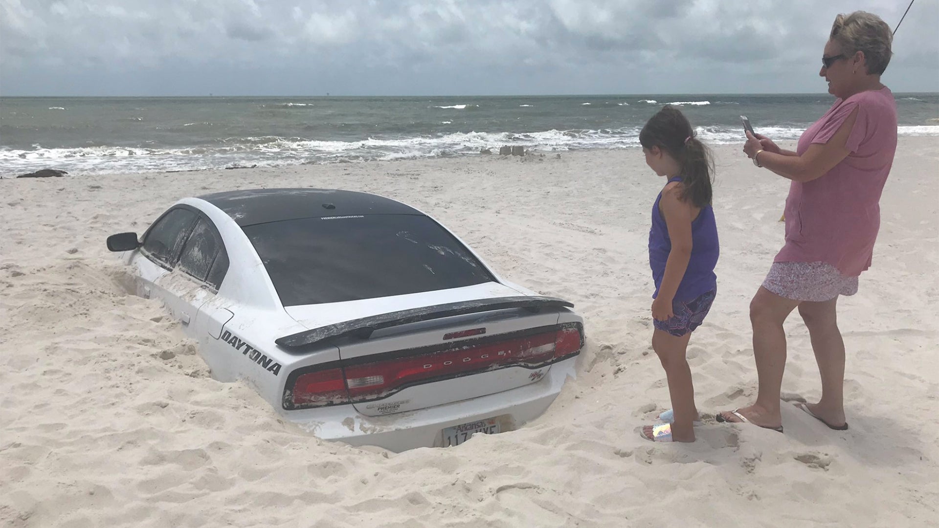 This Beached Dodge Charger Is Buried in Sand Thanks to Hurricane Barry