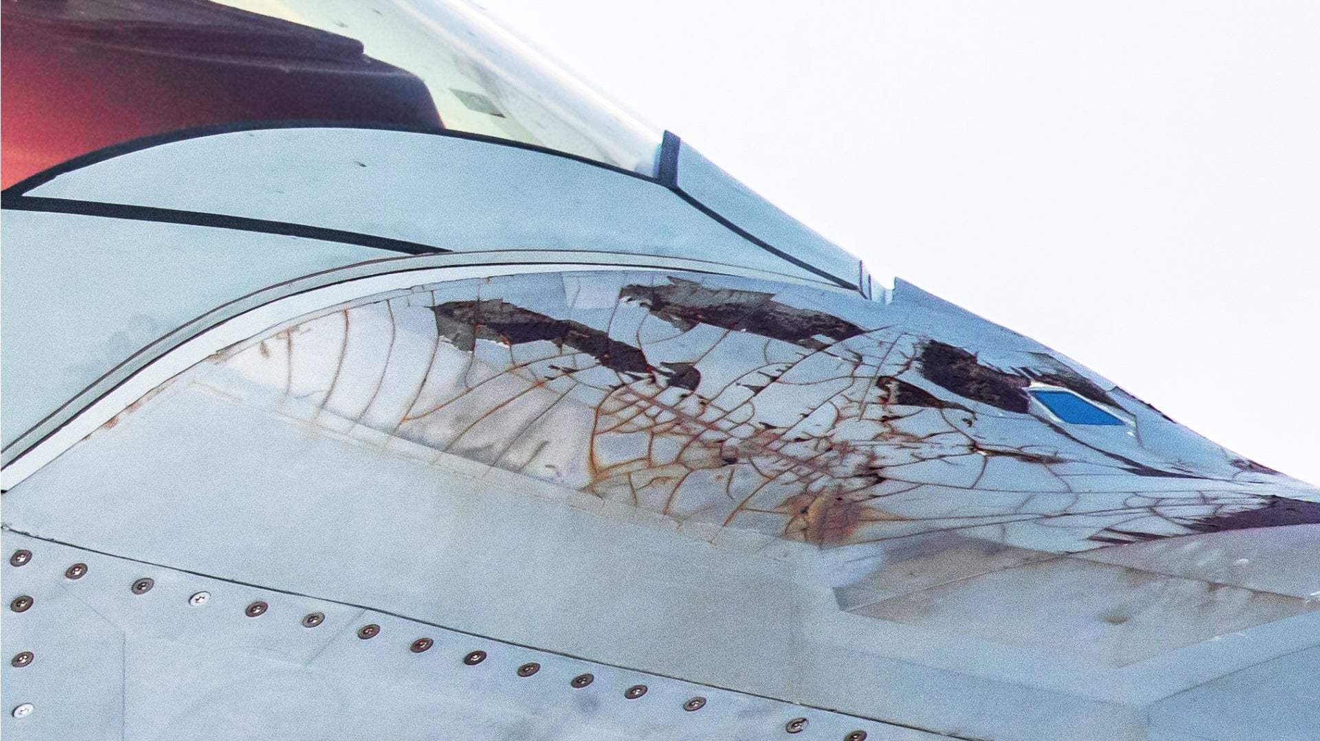 These Images Of An F-22 Raptor’s Crumbling Radar Absorbent Skin Are Fascinating