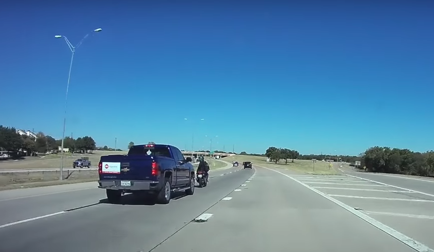 A Case Study in Bad Judgment: Watch as This Motorcyclist Taunts A Pick-Up Truck In Texas and Pays for It Dearly